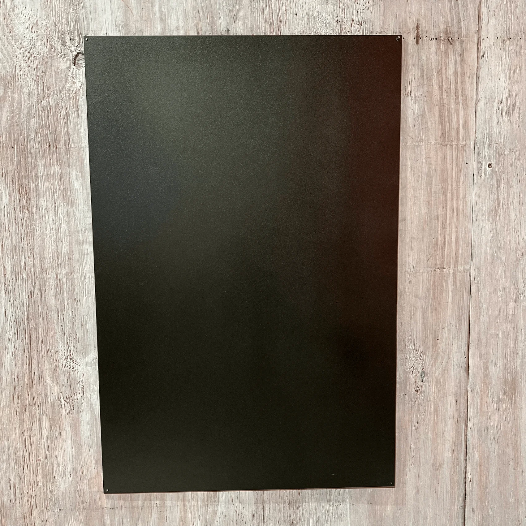 What type of finish/color is used on the rubbed looking metal in the last three photos? Thanks!